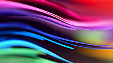 Photo of coloured paper on a stack
